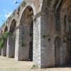 The_12_pillared_arches_of_the_cryptoporticus_of_the_so-called_Sanctuary_of_Jupiter_Anxur,_Terracina,_Italy_(15223208145)